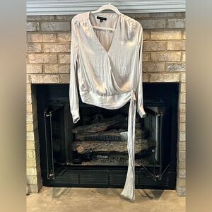 Banana republic Elegant Silver Wrap Blouse size med never worn